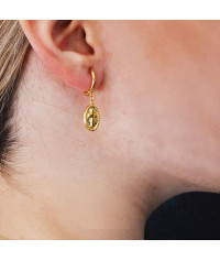 Gold colored hoops with cross
